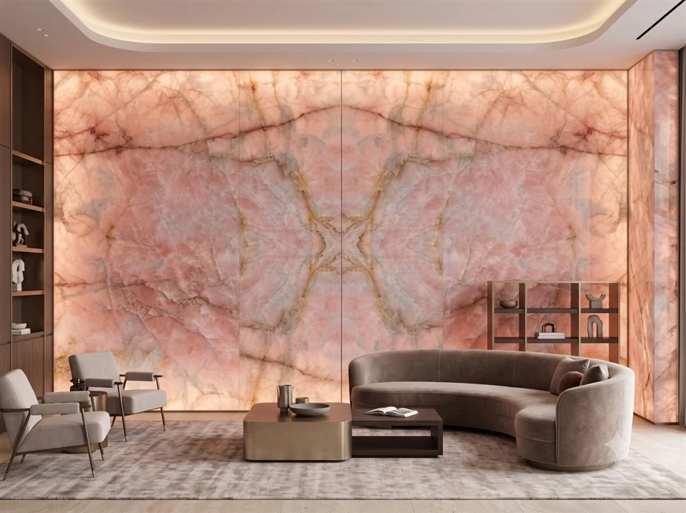 LED backlit feature wall made from Cristallo Pink Quartzite slabs with soft rose pink crystalline translucency